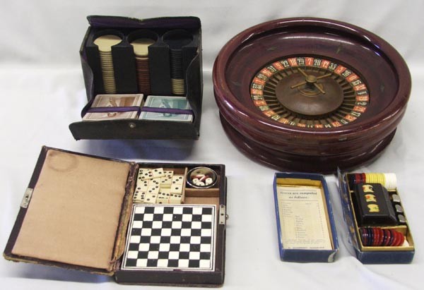 Vintage Gambler's Traveling Kits and Games: Vintage Gambler's Traveling Kits and Games, includes Roulette Wheel, Brodi Game, Domino and Checkerboard, and Poker Chips, Roulette Wheel measures 9.5'' x 3''. SHI $25.