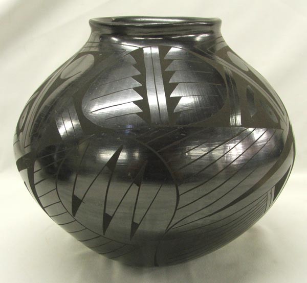 Mata Ortiz Black on Black Pottery by Mario Olivas: Mata Ortiz Black on Black Pottery by Mario Olivas, measures approx. 8.5'' x 9.75'' SHI $45.