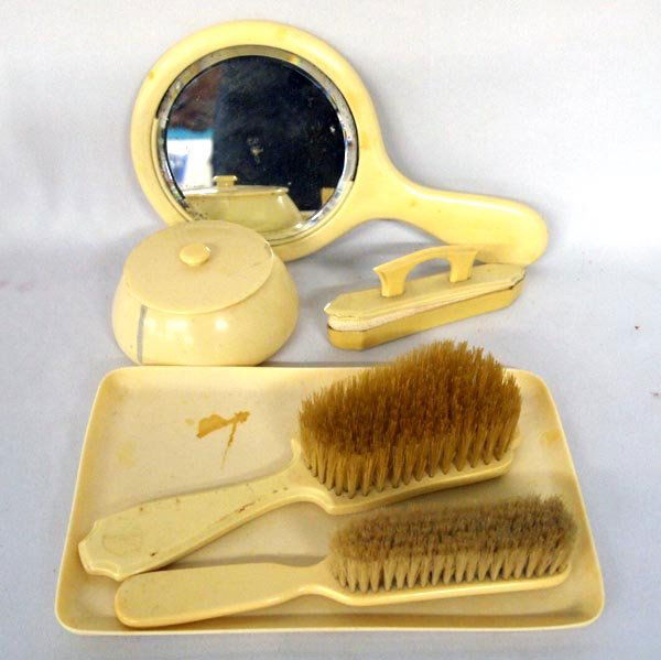 6 pc Vintage Celluloid Dresser Set: 6 pc Vintage Celluloid Dresser Set, mirror measures approx. 10" long, damage to mirror. SHI $25.