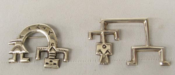 2-1980's Navajo Sterling Yei Pins: 2-1980's Navajo Sterling Yei Pins. Rainbow Guardian Figures. Largest measures approx. 2" x 1 1/3". One is Hallmarked "FJ". SHI $15.