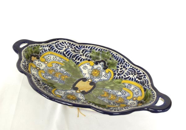 Antique Mexican Bowl Concordia Mexico Hallmarked: Antique Mexican Bowl Concordia Mexico. Has a wire for hanging, Hallmarked by artist. Measures approx. 16.6'' x 9.5''. SHI $25.