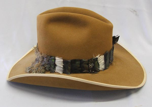 Resistol Cowboy Hat Size 7 1/4 with Feather Hatband: Resistol Cowboy Hat Size 7 1/4. Feather hat band. SHI $30.