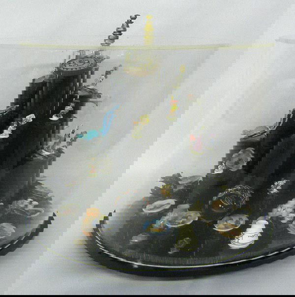 Native American Collection of 26 Micro Miniatures: Native American Collection of Micro Miniatures. In plexiglass cover that lifts off, on table that can be rotated with knob on top. Case measures 10'' diameter x 8.5''. Collection includes mini buffalo