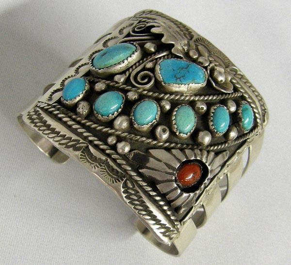Navajo Silver Turquoise Coral Bracelet by E Begay: Navajo Silver Turquoise Coral Bracelet by E Begay. Hallmarked ''EB'' for Edison Begay. Inside measures 7'' including opening. Measures 2-3/8'' at widest. SHI $15.