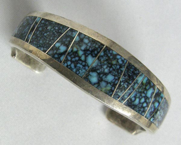 Navajo Silver Bracelet by Charley: Navajo Silver Inlay Turquoise Bracelet by Larry M. Charley, approx. 6''. SHI $15