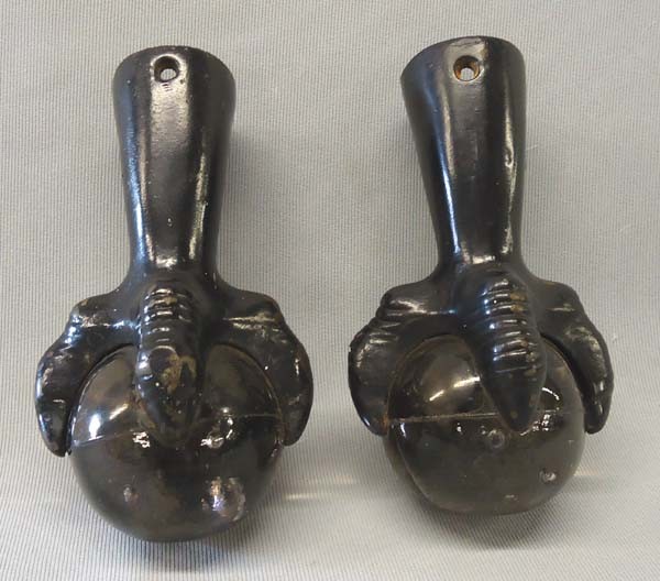Pr Cast Iron Glass Ball Claw Feet: Pr Of Glass Ball Feet. Measures approx. 4.75'' x 2.25''. SHI $20.