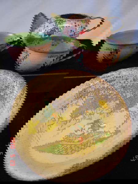 4 Pcs. 1939 Tin Child's Disney Tea Set: 4 Pieces Vintage Tin Child's Disney Tea Set. On the tea cups is written: 1939 Walt Disney Productions, Made in USA, Ohio Art Co., Bryan, Ohio. Plate measures 4.25'' diameter. SHI $20.