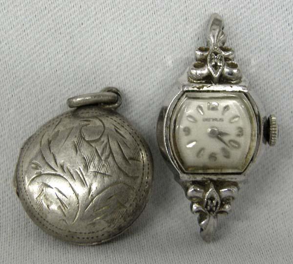 Estate Benrus Diamond Watch and Silver Locket: Estate Benrus Diamond Watch and Silver Locket. Watch does run. Watch measures approx. 1.5'' end to end. Locket measures approx. .75'' in diameter. SHI $15.