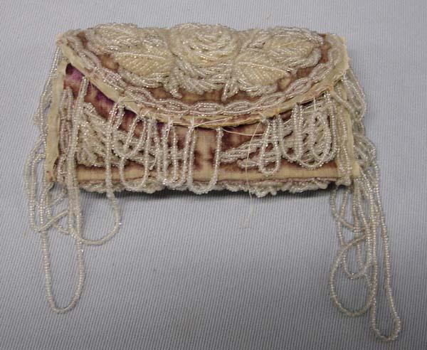 Antique Beaded Iroquois Pin Cushion: Antique Beaded Iroquois Pin Cushion. Measures 7.5''x5'' in open position and 3''x5'' when closed (without fringe). SHI $20.