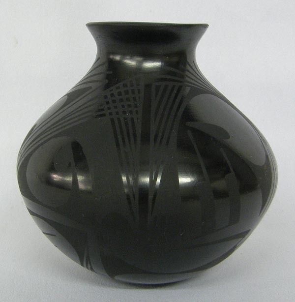 Mata Ortiz Black Burnished Pot by Matilda Quezada: Mata Ortiz Black Burnished Pot by Matilda Quezada. Measures approx. 4.25''Hx4.25''W. SHI $25.