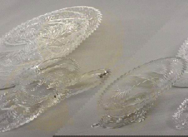 8 Pcs Brilliant Cut Crystal Glass: 8 Pieces Brilliant Cut Crystal Glass. 6 plates, measure approx. 1'' x 5 1/2''. Pitcher measures approx. 5''H x 4 3/4''W. 3 leg flared top Vase 4 1/2''H. Leaded turn of the century glass. SHI $30.