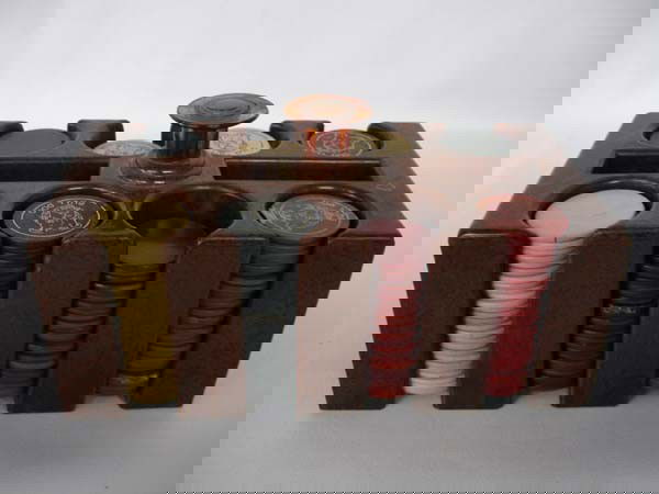 Antique Bull Dog Clay Poker Chips, Bakelite Tray: Antique Bull Dog Clay Poker Chips, in Bakelite Carrying Holder. Some of the chips are blank (do not have ''Bull Dog'' on them. Of the Bull Dog chips, there are 70 white chips, 30 blue and 29 red. Hold