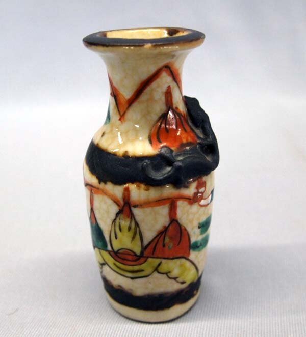 Vintage Cloisonne Mongolian Vase: Vintage Cloisonne Mongolian Vase. Enamel on metal, some shelf ware. Measures approx. 4'' x 1 3/4''. SHI $20.