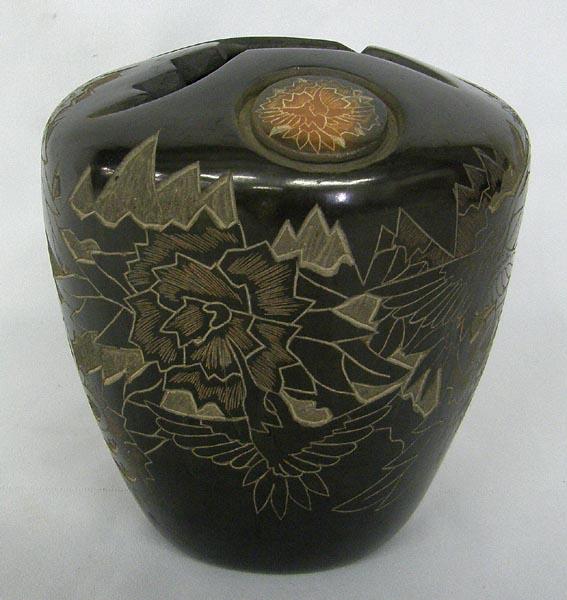 Santa Clara Incised Pot by Eric Tafoya: Santa Clara Incised Pot with Hummingbird and Flower Design by Eric Tafoya. Measures approx. 6''Hx5.75''W. SHI $30.
