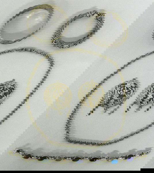 5 Silver Stone Abalone Bracelets Earrings & Chain: 5 Silver Stone and Abalone Bracelets Earrings and Chain. 3 Bracelets, 1 Pair Earrings, 1 Chain. Most is Mexican and 1 Bracelet is Asian. Chain measures approx. 19''L. SHI $15.
