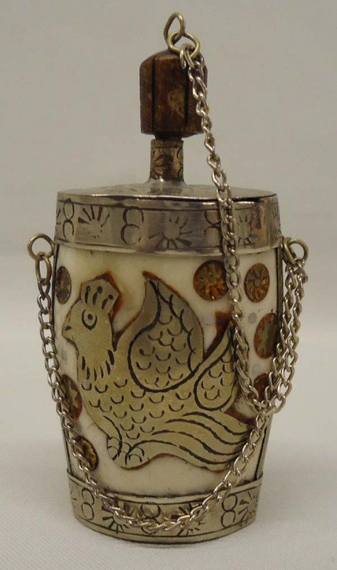 Vintage Nepal Bone Perfume Bottle: Vintage Nepal Perfume Bottle. Metal with bone inlay. Measures approx. 3''. SHI $15.