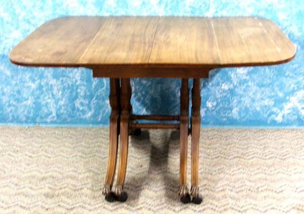 Duncan Phyfe Dining Room Table MUST BE PICKED UP: Antique Duncan Phyfe Dining Room Table. Metal Feet and new coasters. Measures approx. 31''H x 54''L x 42''W. Missing Table Extensions. MUST BE PICKED UP!