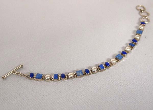 Navajo Silver Lapis Denim Turquoise Link Bracelet: Navajo Silver Lapis Denim Turquoise Link Bracelet, with intermittent pearls. End to end measurement 8.5'', x .25''W. SHI $15