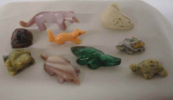 9 Zuni Micro Mini Fetishes: 9 Zuni Micro Mini Fetishes. The largest is the one which is just a head and it measures 1''x0.75''. Includes 2 frogs, 2 badgers, 2 turtles, fox, cougar and the head. SHI $15.