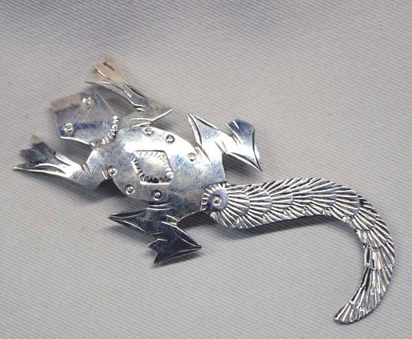 Navajo Silver Lizard Pin by Louise Yazzie: Navajo Sterling Silver Lizard Pin by Louise Yazzie. Measures approx. 3''L. SHI $15