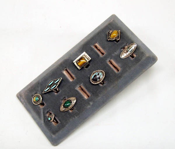8 Zuni Navajo Silver Turquoise Rings Plus: 8 Zuni Navajo Silver Turquoise Rings Plus. One Tiger Eye set in silver. The Zuni diamond shape ring with four turquoise nuggets is a size 9.5 (it's the largest size in the group) and the setting measu