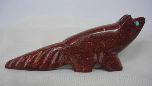 Zuni Carved Pipestone Fetish: Zuni Carved Pipestone Fetish. Turquoise eyes. Hairline scratch across left side. Measures 3.5''x1.25''. SHI $15.