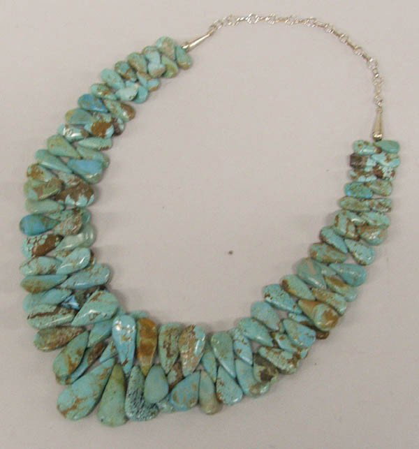 Navajo Turquoise Petal Necklace by Sadie Dixon: Navajo Turquoise Petal Necklace by Sadie Dixon. Hand carved turquoise from the Edgar, NV No. 8 mine (rare and the mine is now closed). A Certificate of Authenticity from the Howldig Dog Trader in Ball
