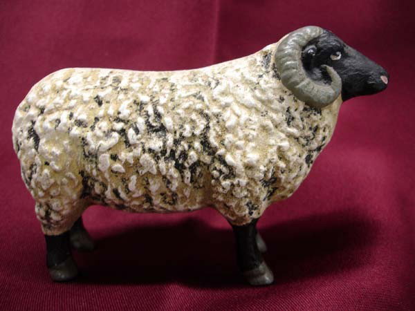 Antique Cast Iron Sheep Bank: Antique Cast Iron Sheep Bank. Measures 5''Lx3.75''H. Buyers Pay Actual Shipping and Handling Charges(see terms and conditions for more information).