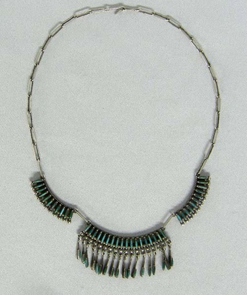 Native American Zuni Needlepoint Necklace: Native American Zuni Needlepoint Necklace with Hand Made Chain. Measures approx. 14.5'' end to end, the center piece measures approx. 2''Lx.75''W. Buyers Pay Actual Shipping and Handling Charges(see t