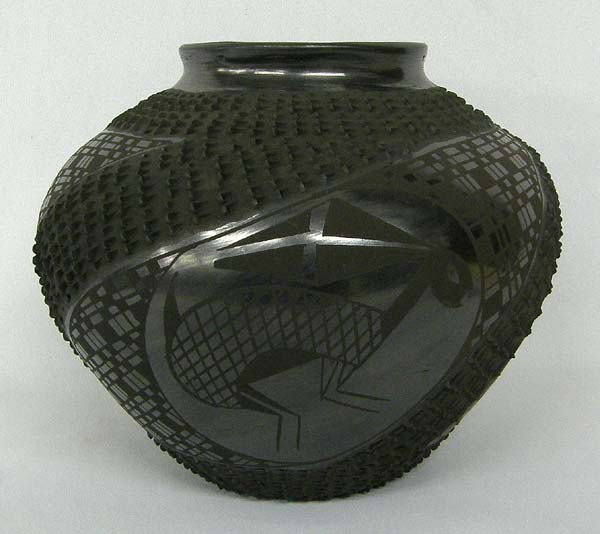 Mata Ortiz Textured Black Rabbit Pot by M. Olivas: Mata Ortiz Textured Black Rabbit Pot by Mario Olivas. Measures approx. 7''Hx8''W. Buyers Pay Actual Shipping and Handling Charges(see terms and conditions for more information).
