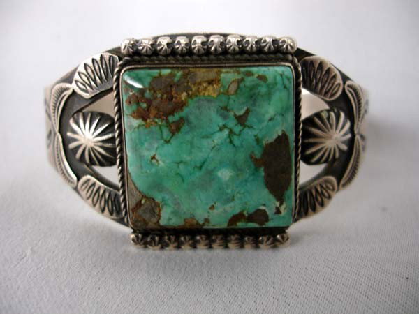 Native American Navajo Turquoise Bracelet by K Smith: Navajo Red Mountain Turquoise and Silver Bracelet by Kirk Smith. Hallmark on inside, ''KS'' for Kirk Smith. Also stamped ''Sterling'' on inside. Measurement in Inches - Inside Length(Including Opening