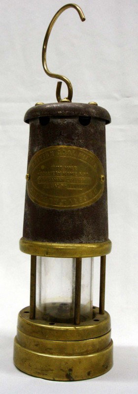 British Coal Mining Co. Brass Hanging Lamp: British Coal Mining Co. Brass Hanging Lamp. Brass plate says, ''British Coal Mining Company Wales UK, Type Vale Colliery Name & No. Aberaman Colliery Serial No. 110388. Measures 12.5''H including hand