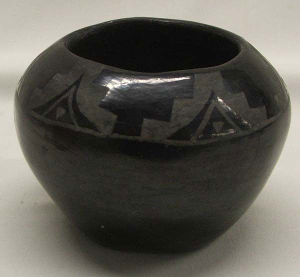 Native American San Ildefonso Black On Black Pottery: San Ildefonso Black On Black Pottery Bowl, measures approx. 3 1/3''H x 4 1/3''W. Buyers Pay Actual Shipping and Handling Charges(see terms and conditions for more information).