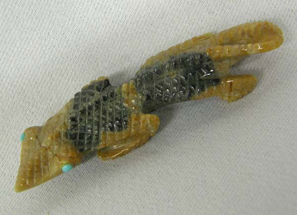 Native American Zuni Lizard Fetish by Alvin Haloo: Native American Zuni Picasso Stone Lizard Fetish by Alvin Haloo. Measures approx. 2.25''Lx.5''W. Buyers Pay Actual Shipping and Handling Charges(see terms and conditions for more information).