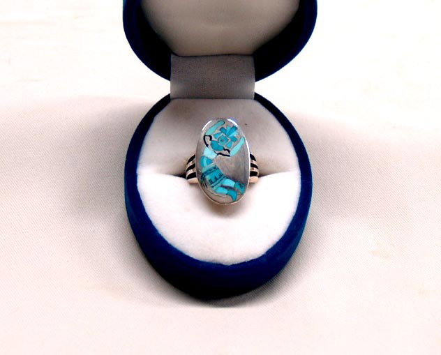 Native American Zuni Lone Mountain Turquoise Ring : Zuni Lone Mountain Turquoise Ring by Harlan Coonsis. Knifewing figure in turquoise from the Lone Mountain mine at Tonopah, NV. The family of the deceased founder of the mine, M. C. Winfield have offer