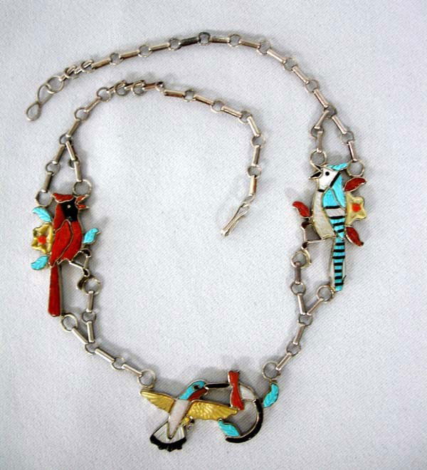 1960s Native American Zuni Inlay Bird Necklace : 1960s Zuni Birds Necklace Silver & Stone Inlay. Turquoise, Coral, Jet, MOP, Abalone in the birds. Artist's signature on back. Measures 17.5'' end to end. Center hummingbird is 1-1/4''Hx1-5/8''W. Buyer