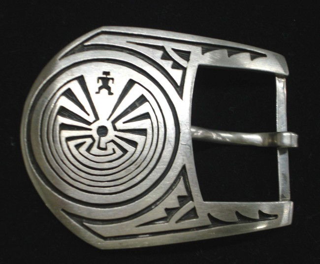 Native American Hopi Silver ''Man in Maze'' Buckle: Hopi Overlay Sterling ''Man in Maze'' Buckle. Measures 2.5''x2''. Belt opening is 1-1/8''. Stamped on back, ''Sterling.'' Buyers Pay Actual Shipping and Handling Charges(see terms and conditions for m
