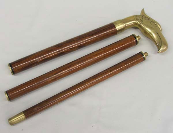 Brass Eagle Cane With Hidden Cigar Holder: Brass Eagle Cane With Bottle Inside For Cigar. Measurement in Inches - End to End Length 34'' x Width 4 1/2''. Buyers Pay Actual Shipping and Handling Charges(see terms and conditions for more informa