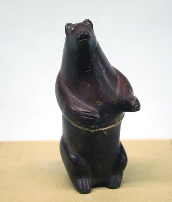 Older Native American Zuni Pipestone Bear Fetish: Native American Zuni Pipestone Bear Fetish, has turquoise, coral, and stone arrowhead powerpack on back, measures 3.5'' x 1.5''. Buyers Pay Actual Shipping and Handling Charges(see terms and condition