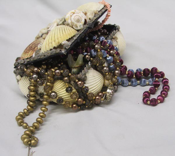 Shell Covered Jewelry Box And Jewelry Plus: Shell Covered Jewelry Box And Jewelry Plus. 8 Necklaces, longest measures approx. 30''. 2 watches and 2 stone burrows. Buyers Pay Actual Shipping and Handling Charges(see terms and conditions for more