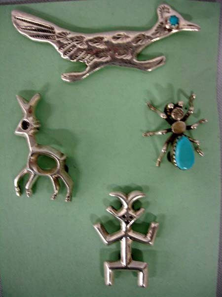 4 Native American Navajo Silver Pins by F. Johnson: 4 Native American Navajo Sterling Silver Pins by Florence Johnson. Each pin is hallmarked ''FJ'' for Florence Johnson. The Road Runner measures 2-3/8''x1''. Buyers Pay Actual Shipping and Handling Cha