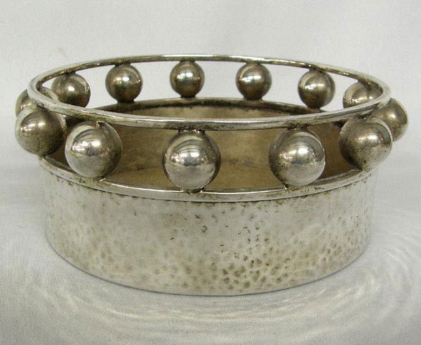 Emilia Castillo Silver Plate Bottle Coaster: Emilia Castillo Silver Plate Bottle Coaster. Measures approx. 2''Hx5.25''W. Buyers Pay Actual Shipping and Handling Charges(see terms and conditions for more information).