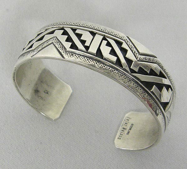 Native American Navajo Bracelet by Peter Nelson: Native American Navajo Sterling Overlay Bracelet by Peter Nelson, measures .75'' wide and 6.25'' inside. Buyers Pay Actual Shipping and Handling Charges(see terms and conditions for more information).
