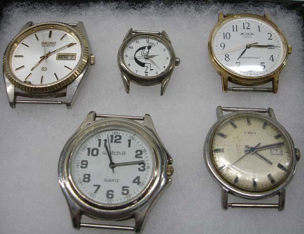 5 Watches Without Bands: 5 Watches Without Bands. Includes a Seiko Quartz calendar watch, an Acqua Quartz calendar, a Watch-It Quartz (this is the largest one at 1.5'' diameter), a Timex calendar and a small watch with a Koko