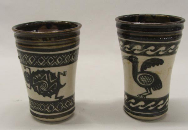 Pair Glazed Cups: Pair Glazed Cups Hallmarked. Measure approx. 6 1/2''H. Buyers Pay Actual Shipping and Handling Charges(see terms and conditions for more information).