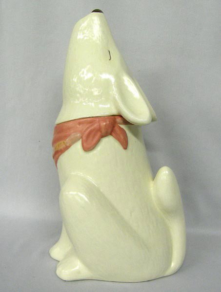 Coyote Pottery Cookie Jar: Coyote Pottery Cookie Jar. Measures approx. 15''Hx8''W. Some small chips on rim. Buyers Pay Actual Shipping and Handling Charges(see terms and conditions for more information).