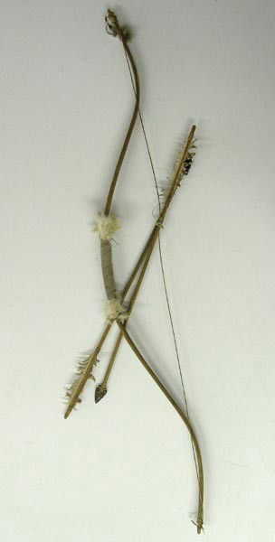 Pueblo Indian Bow and Arrows: Pueblo Indian Bow and Arrows. 2 arrows, bow measures approx. 47''L x 1''W. Buyers Pay Actual Shipping and Handling Charges(see terms and conditions for more information).