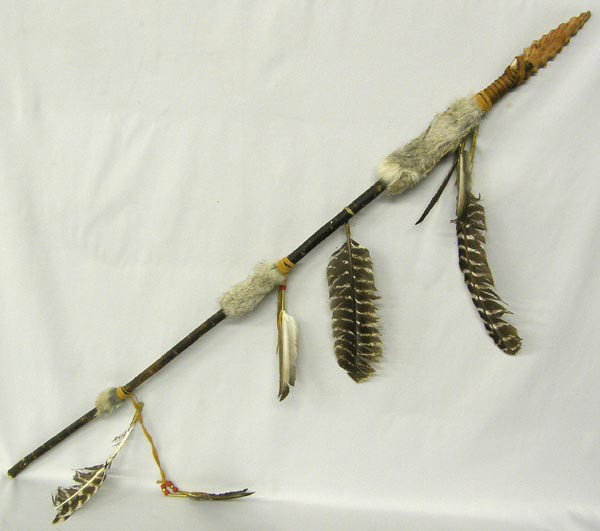 Pueblo Dance Spear: Pueblo Dance Spear embellished with rabbit fur, feathers, and leather. Measures approx. 46''L x 1.5''W.. Buyers Pay Actual Shipping and Handling Charges(see terms and conditions for more information).