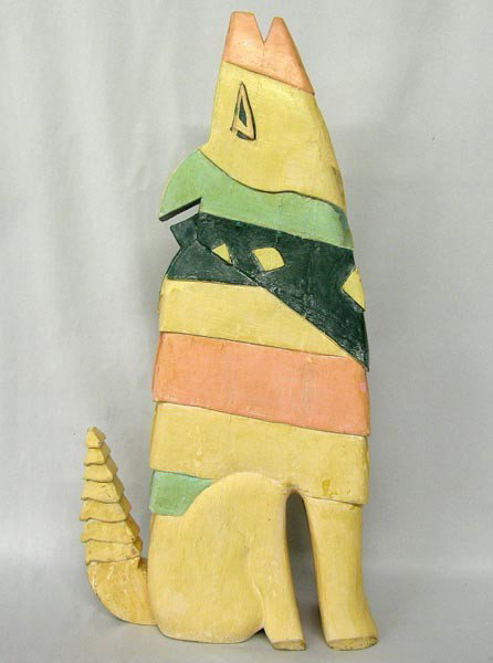 Large Painted Wood Coyote Sculpture: Large Painted Wood Coyote Sculpture. Measures approx. 22.75''Hx10.5''Lx3.5''W. Paint is chipping off in some places. Buyers Pay Actual Shipping and Handling Charges(see terms and conditions for more i