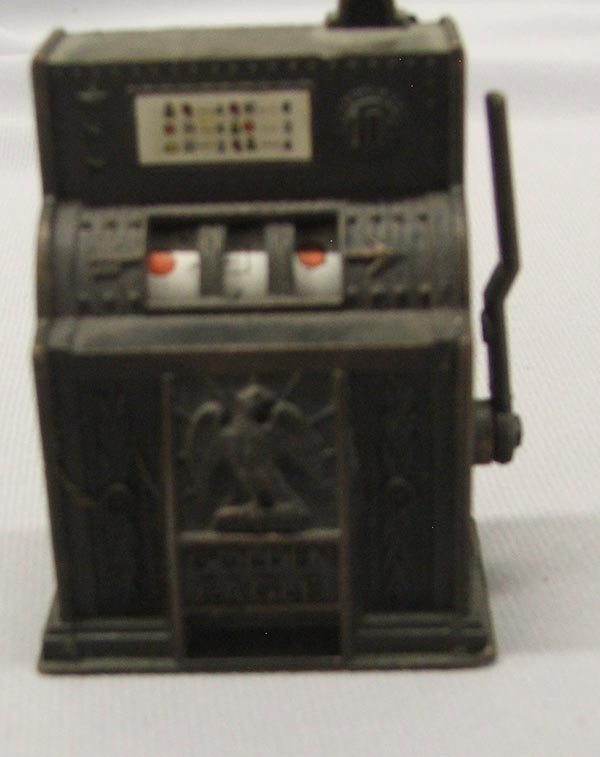 Golden Eagle Slot Machine Pencil Sharpener: Golden Eagle Slot Machine Pencil Sharpener. Measures approx. 2 1/3''H x 1 3/4''W x 1 1/3''D. Buyers Pay Actual Shipping and Handling Charges(see terms and conditions for more information).